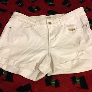 White ripped shorts
